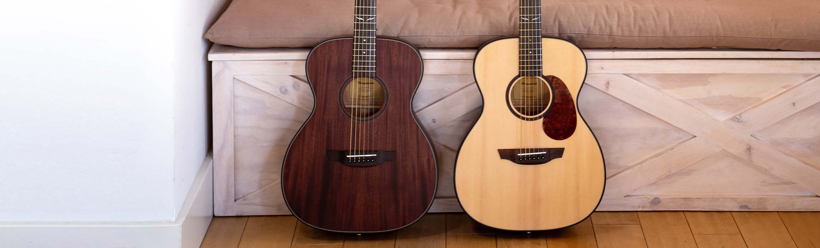 person playing oliver mahogany guitar